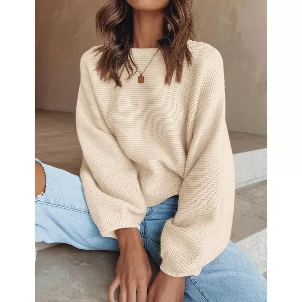 imageZESICA Womens 2023 Crew Neck Long Lantern Sleeve Casual Loose Ribbed Knit Solid Soft Pullover Sweater TopsApricot