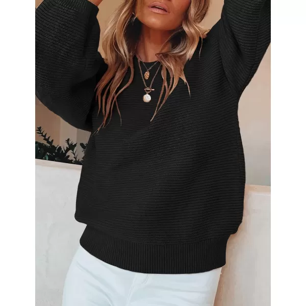 imageZESICA Womens 2023 Crew Neck Long Lantern Sleeve Casual Loose Ribbed Knit Solid Soft Pullover Sweater TopsBlack