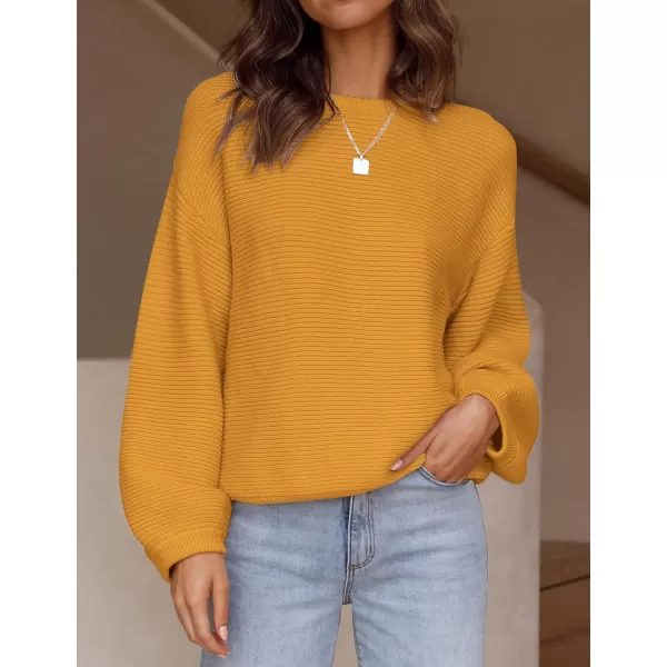 imageZESICA Womens 2023 Crew Neck Long Lantern Sleeve Casual Loose Ribbed Knit Solid Soft Pullover Sweater TopsGinger