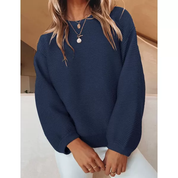 imageZESICA Womens 2023 Crew Neck Long Lantern Sleeve Casual Loose Ribbed Knit Solid Soft Pullover Sweater TopsNavy