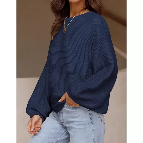 imageZESICA Womens 2023 Crew Neck Long Lantern Sleeve Casual Loose Ribbed Knit Solid Soft Pullover Sweater TopsNavy