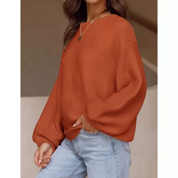 imageZESICA Womens 2023 Crew Neck Long Lantern Sleeve Casual Loose Ribbed Knit Solid Soft Pullover Sweater TopsOrange
