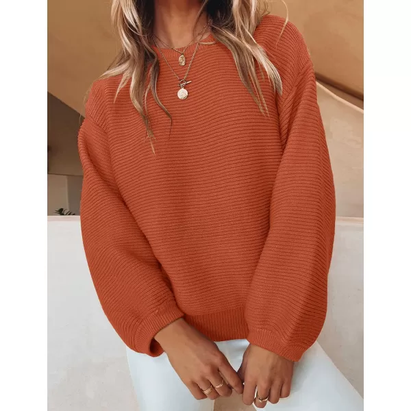 imageZESICA Womens 2023 Crew Neck Long Lantern Sleeve Casual Loose Ribbed Knit Solid Soft Pullover Sweater TopsOrange