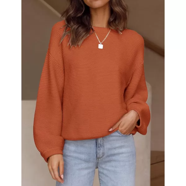 imageZESICA Womens 2023 Crew Neck Long Lantern Sleeve Casual Loose Ribbed Knit Solid Soft Pullover Sweater TopsOrange