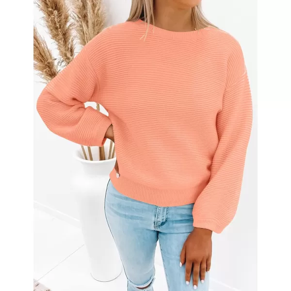 imageZESICA Womens 2023 Crew Neck Long Lantern Sleeve Casual Loose Ribbed Knit Solid Soft Pullover Sweater TopsPeach