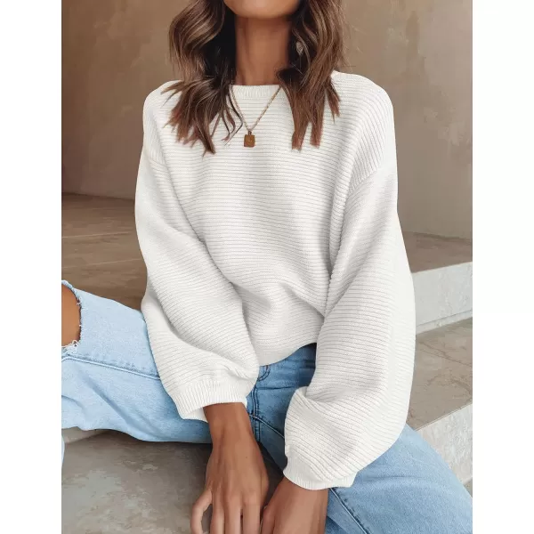 imageZESICA Womens 2023 Crew Neck Long Lantern Sleeve Casual Loose Ribbed Knit Solid Soft Pullover Sweater TopsWhite