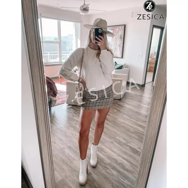 imageZESICA Womens 2023 Crew Neck Long Lantern Sleeve Casual Loose Ribbed Knit Solid Soft Pullover Sweater TopsWhite