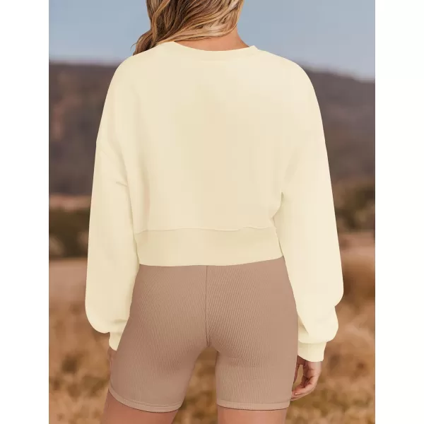 imageZESICA Womens 2023 Crop Sweatshirts Casual Long Sleeve Crewneck Solid Color Y2K Fleece Loose Pullover Sweatshirt TopsApricot