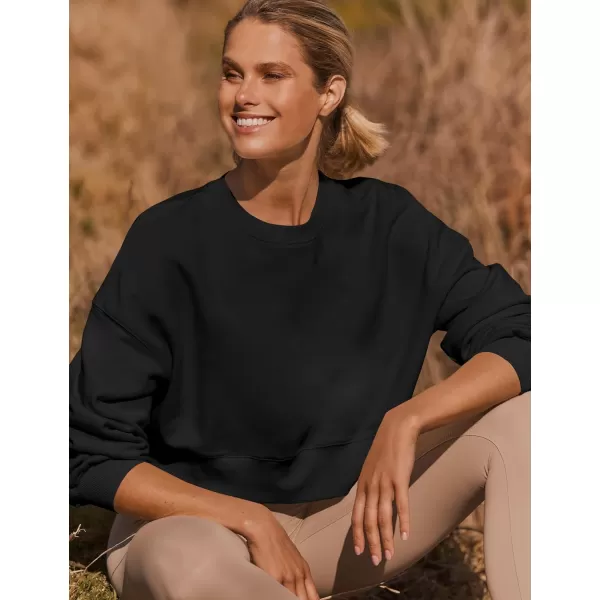 imageZESICA Womens 2023 Crop Sweatshirts Casual Long Sleeve Crewneck Solid Color Y2K Fleece Loose Pullover Sweatshirt TopsBlack
