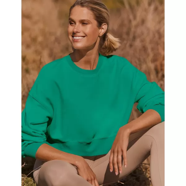 imageZESICA Womens 2023 Crop Sweatshirts Casual Long Sleeve Crewneck Solid Color Y2K Fleece Loose Pullover Sweatshirt TopsGreen