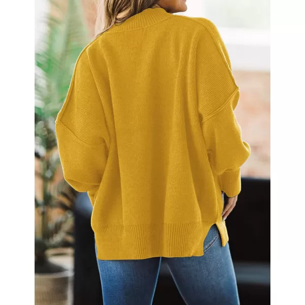 imageZESICA Womens 2023 Fall Casual Long Sleeve Crew Neck Side Slit Oversized Ribbed Knit Pullover Sweater TopsGinger