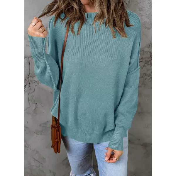 imageZESICA Womens 2023 Fall Casual Long Sleeve Crew Neck Side Slit Oversized Ribbed Knit Pullover Sweater TopsLake