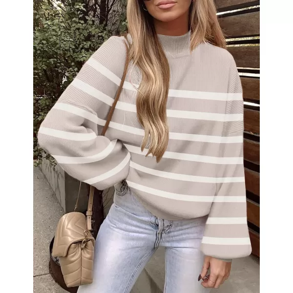 imageZESICA Womens 2023 Fall Fashion Turtleneck Long Sleeve Striped Ribbed Knit Loose Pullover Sweater TopsAlmond