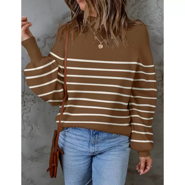 imageZESICA Womens 2023 Fall Fashion Turtleneck Long Sleeve Striped Ribbed Knit Loose Pullover Sweater TopsTan