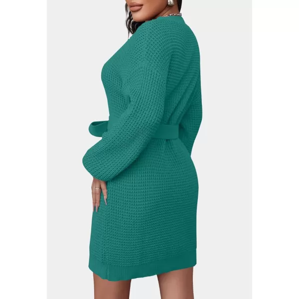 imageZESICA Womens 2023 Fall Long Sleeve Solid Color Waffle Knitted Tie Wasit Tunic Pullover Sweater DressPeacock