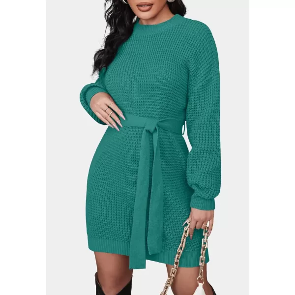 imageZESICA Womens 2023 Fall Long Sleeve Solid Color Waffle Knitted Tie Wasit Tunic Pullover Sweater DressPeacock