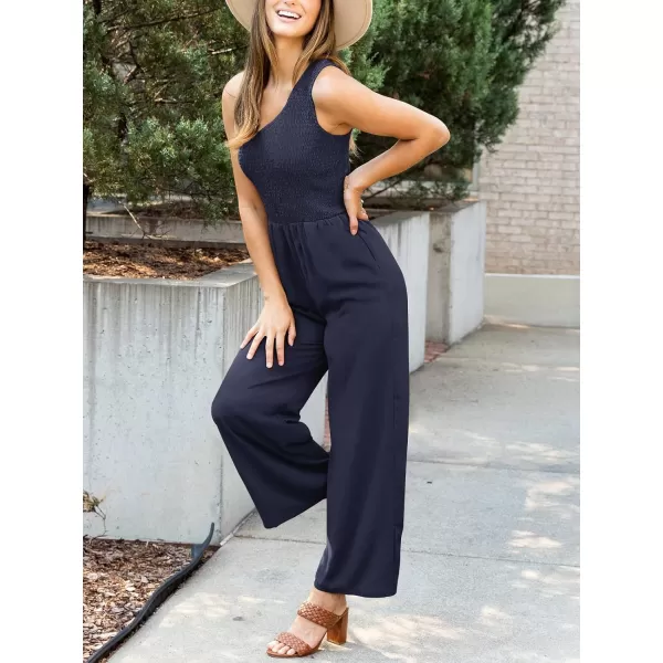 imageZESICA Womens 2023 Summer Casual One Shoulder Sleeveless Smocked High Waist Loose Wide Leg Jumpsuit Romper with PocketsNavy