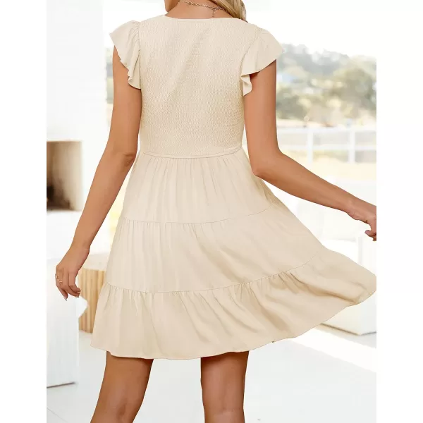 imageZESICA Womens 2023 Summer Casual V Neck Flutter Sleeve Bohemian Ruffle Smocked A Line Swing Mini DressBeige