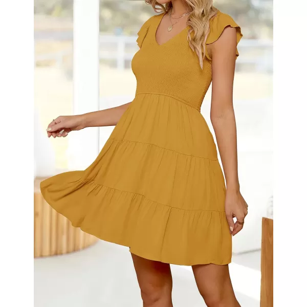 imageZESICA Womens 2023 Summer Casual V Neck Flutter Sleeve Bohemian Ruffle Smocked A Line Swing Mini DressGinger