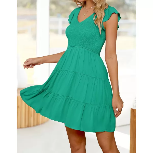 imageZESICA Womens 2023 Summer Casual V Neck Flutter Sleeve Bohemian Ruffle Smocked A Line Swing Mini DressGreen