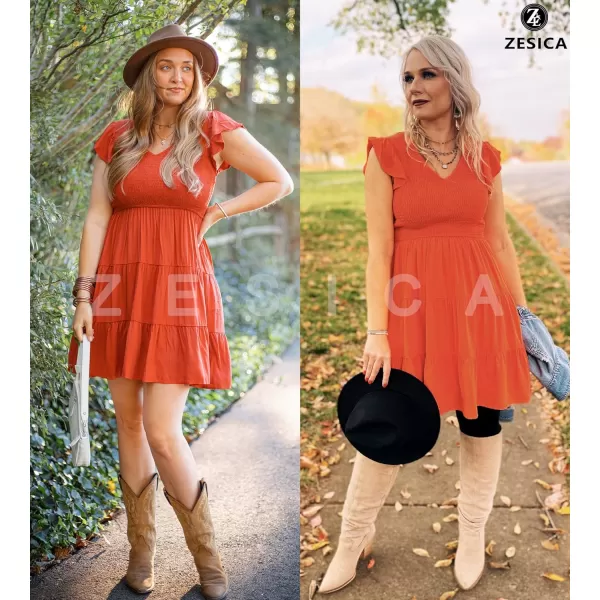 imageZESICA Womens 2023 Summer Casual V Neck Flutter Sleeve Bohemian Ruffle Smocked A Line Swing Mini DressOrange