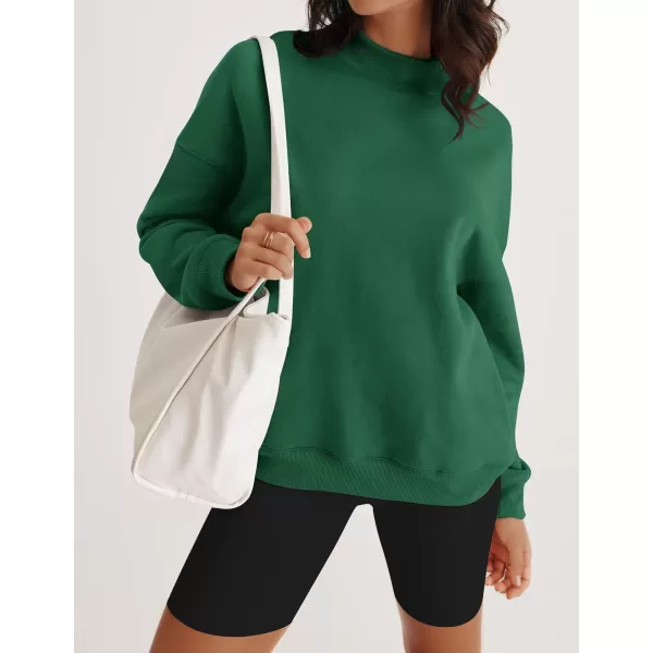 imageZESICA Womens 2023 Sweatshirts Casual Long Sleeve Mock Neck Y2K Fleece Loose Pullover Sweatshirt Tops with PocketsEmerald