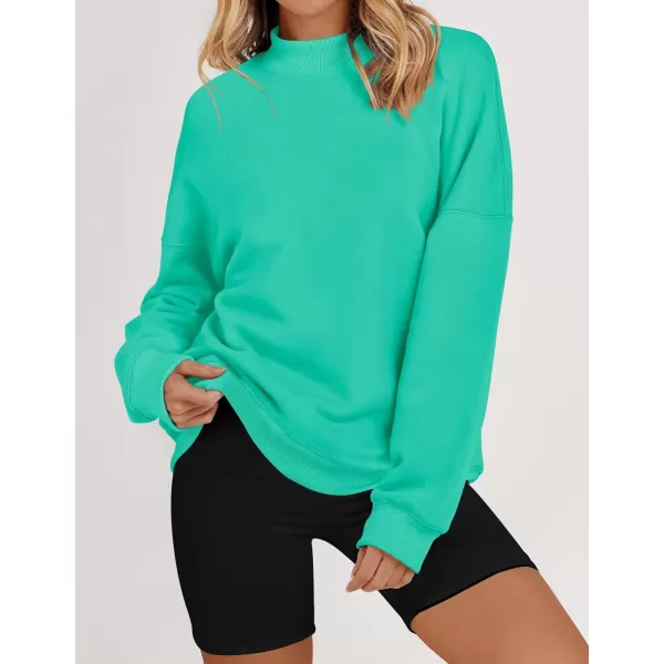 imageZESICA Womens 2023 Sweatshirts Casual Long Sleeve Mock Neck Y2K Fleece Loose Pullover Sweatshirt Tops with PocketsLake