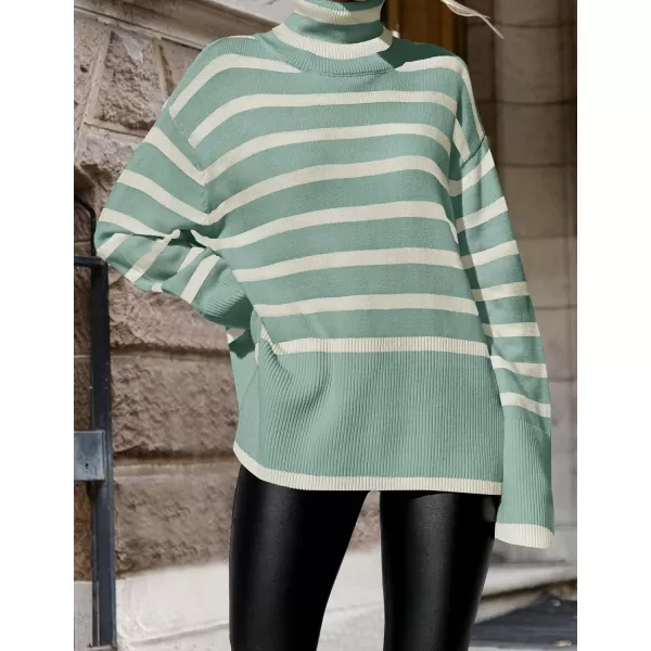 imageZESICA Womens 2023 Winter Sweaters Casual Turtleneck Long Sleeve Striped Side Slit Loose Pullover Sweater Jumper TopsLake