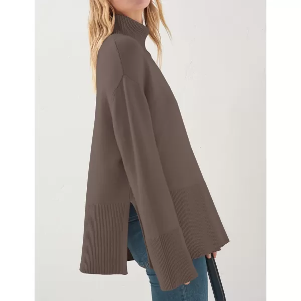 imageZESICA Womens 2023 Winter Sweaters Casual Turtleneck Long Sleeve Striped Side Slit Loose Pullover Sweater Jumper TopsNutmeg