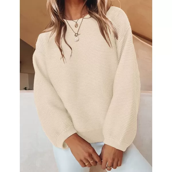 imageZESICA Womens 2024 Crew Neck Long Lantern Sleeve Casual Loose Ribbed Knit Solid Soft Pullover Sweater TopsApricot