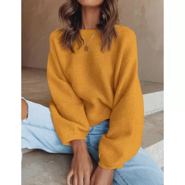 imageZESICA Womens 2024 Crew Neck Long Lantern Sleeve Casual Loose Ribbed Knit Solid Soft Pullover Sweater TopsGinger