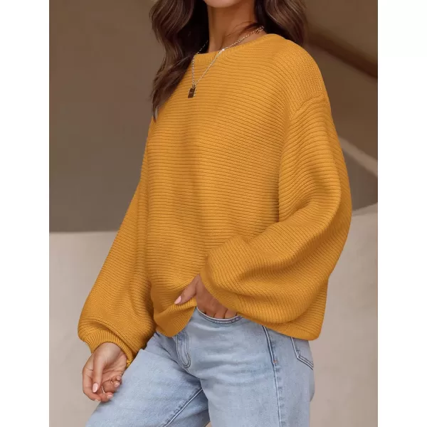 imageZESICA Womens 2024 Crew Neck Long Lantern Sleeve Casual Loose Ribbed Knit Solid Soft Pullover Sweater TopsGinger