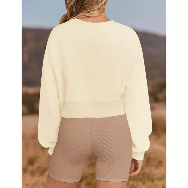 imageZESICA Womens 2024 Crop Sweatshirts Casual Long Sleeve Crewneck Solid Color Y2K Fleece Loose Pullover Sweatshirt TopsApricot
