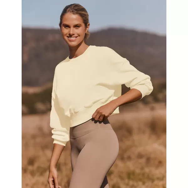 imageZESICA Womens 2024 Crop Sweatshirts Casual Long Sleeve Crewneck Solid Color Y2K Fleece Loose Pullover Sweatshirt TopsApricot