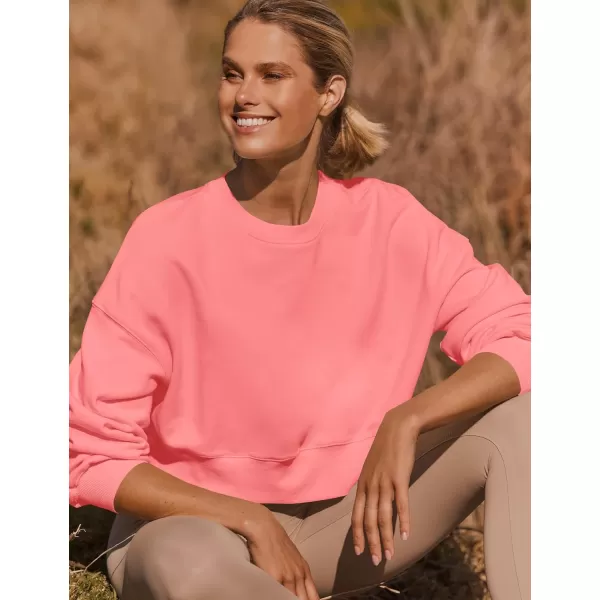 imageZESICA Womens 2024 Crop Sweatshirts Casual Long Sleeve Crewneck Solid Color Y2K Fleece Loose Pullover Sweatshirt TopsCoral
