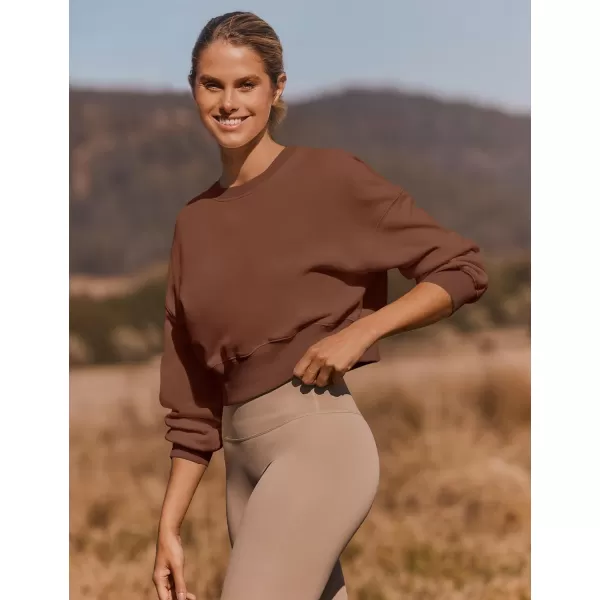 imageZESICA Womens 2024 Crop Sweatshirts Casual Long Sleeve Crewneck Solid Color Y2K Fleece Loose Pullover Sweatshirt TopsTan
