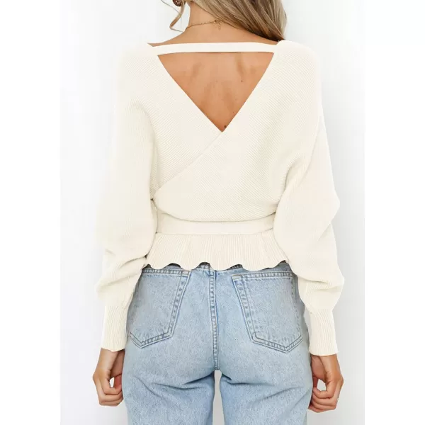 imageZESICA Womens 2024 Fall Wrap V Neck Long Batwing Sleeve Belted Waist Ruffle Knitted Sweater Pullover TopIvory