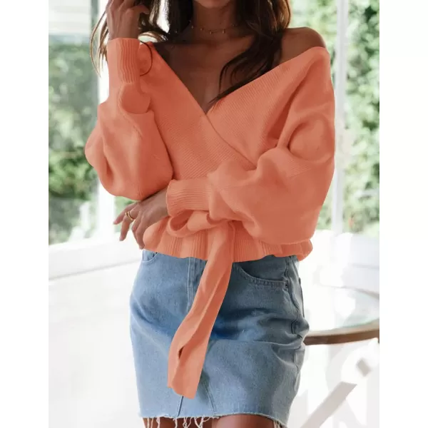 imageZESICA Womens 2024 Fall Wrap V Neck Long Batwing Sleeve Belted Waist Ruffle Knitted Sweater Pullover TopPeach