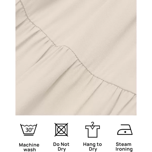 imageZESICA Womens 2024 Summer Casual Sleeveless Crew Neck Smocked High Waist Flowy Tiered A Line Midi DressBeige