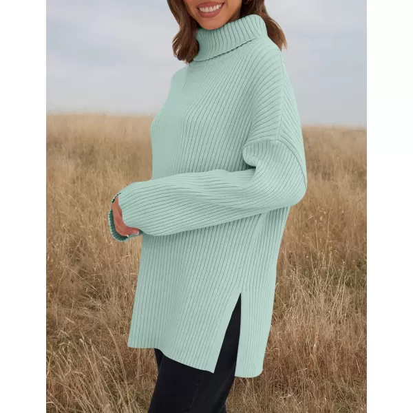 imageZESICA Womens 2024 Winter Sweaters High Neck Long Sleeve Chunky Knit Oversized Side Slit Pullover Sweater Jumper TopsMint