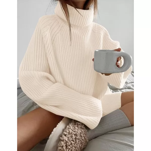 imageZESICA Womens 2024 Winter Sweaters Oversized Turtleneck Long Sleeve Chunky Knitted Tunic Pullover TopsApricot
