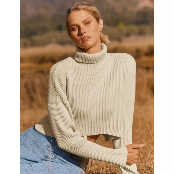imageZESICA Womens Cropped Turtleneck Sweaters 2023 Fall Long Sleeve Ribbed Knit Oversized Casual Pullover Sweater TopsApricot