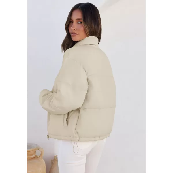 imageZESICA Womens Long Sleeve Cropped Puffer Jacket Winter Zipper Quilted Baggy Warm Short Down Coat Outwear with PocketsApricot