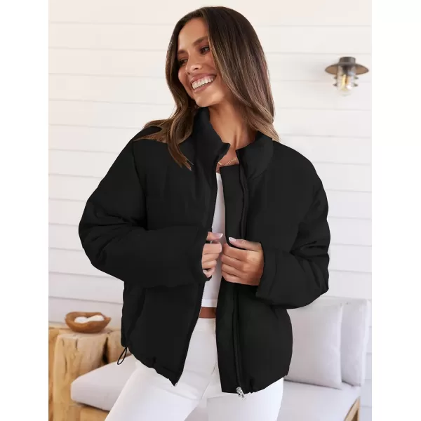 imageZESICA Womens Long Sleeve Cropped Puffer Jacket Winter Zipper Quilted Baggy Warm Short Down Coat Outwear with PocketsBlack
