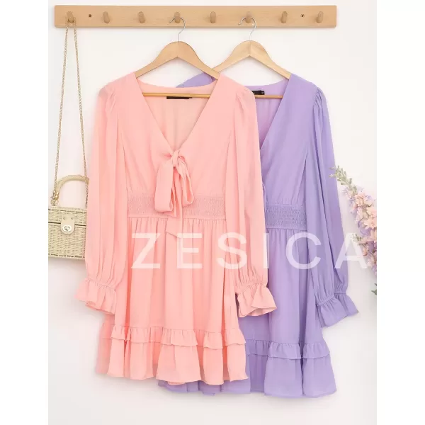 imageZESICA Womens Sexy Deep V Neck Knot Front Long Sleeve Smocked Wiast Ruffle Tiered Swing Mini Skater DressCoralpink