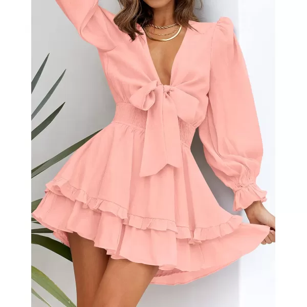 imageZESICA Womens Sexy Deep V Neck Knot Front Long Sleeve Smocked Wiast Ruffle Tiered Swing Mini Skater DressCoralpink