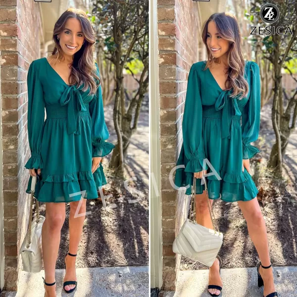 imageZESICA Womens Sexy Deep V Neck Knot Front Long Sleeve Smocked Wiast Ruffle Tiered Swing Mini Skater DressDarkgreen