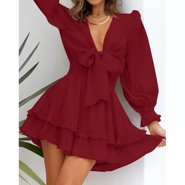 imageZESICA Womens Sexy Deep V Neck Knot Front Long Sleeve Smocked Wiast Ruffle Tiered Swing Mini Skater DressDarkred