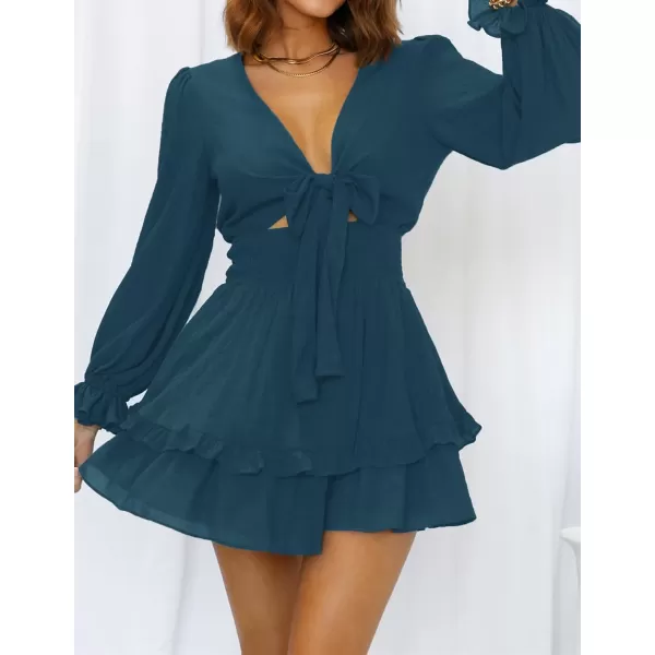 imageZESICA Womens Sexy Deep V Neck Knot Front Long Sleeve Smocked Wiast Ruffle Tiered Swing Mini Skater DressNavy