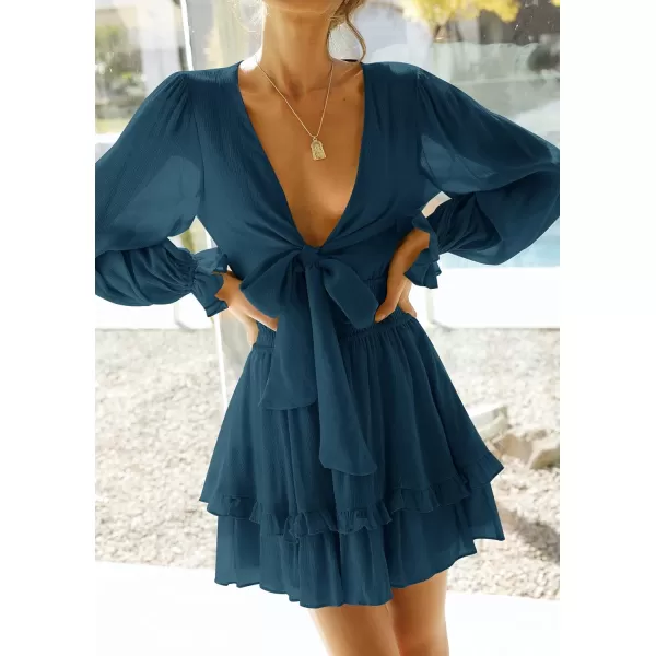 imageZESICA Womens Sexy Deep V Neck Knot Front Long Sleeve Smocked Wiast Ruffle Tiered Swing Mini Skater DressNavy